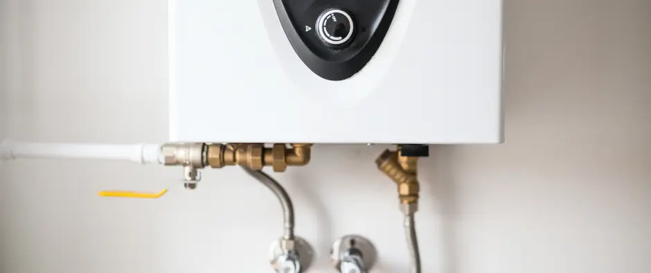 new tankless hot water heater mounted on wall